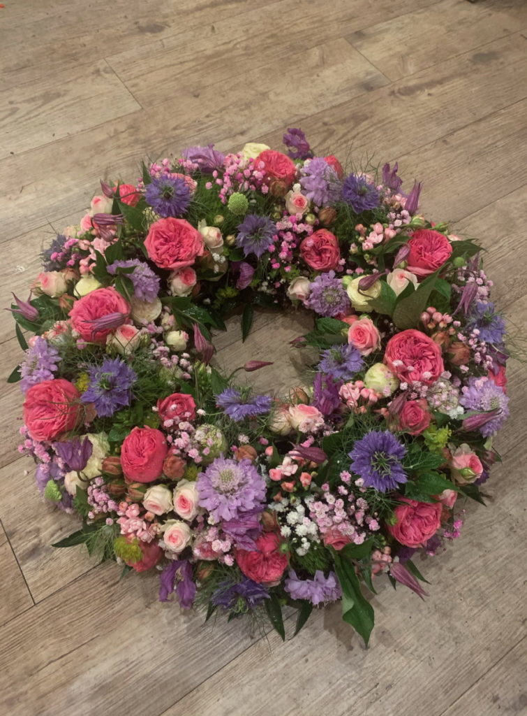 Blumen Kranz Trauer lila und pink und weiß